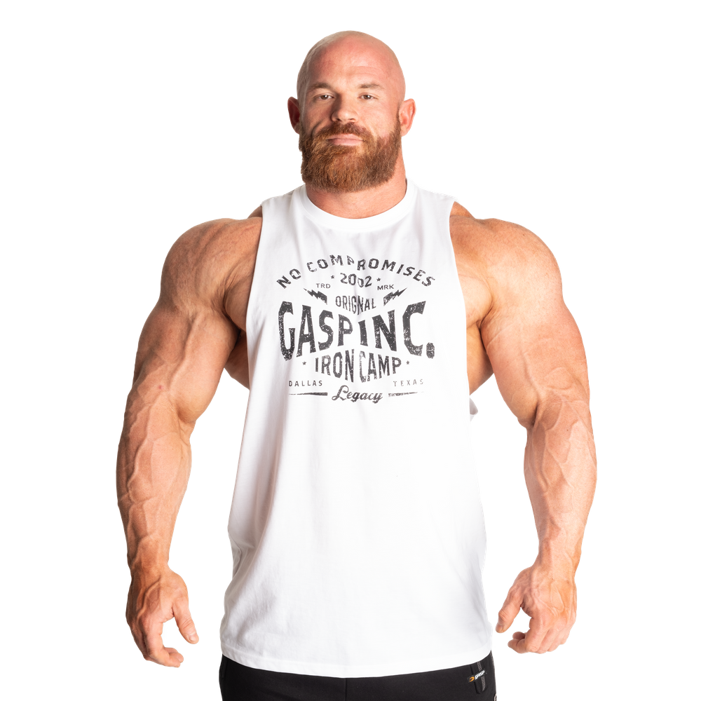 A classic cut out tank with dropped armholes and raw cut edges. - GASP